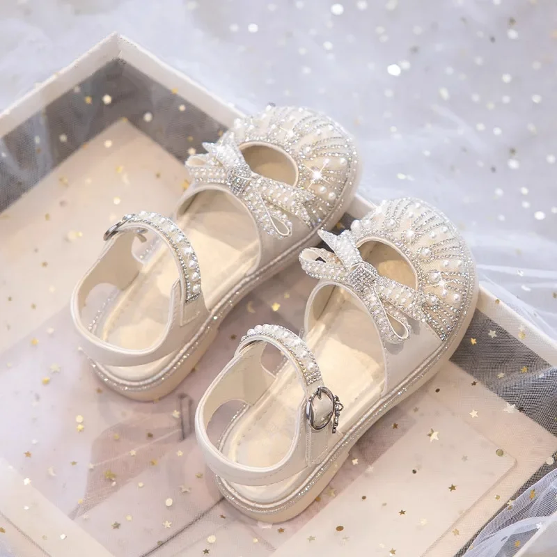 

2025 Summer Princess Flat Shoes Cut-outs Hollow Shoes Cute Girls Flat with Pearls Beading Bow-knot Kids Half Sandals