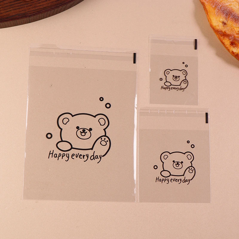 100Pcs Cute Cartoon Bear Pattern Transparent Bread Gift Wrap Self-sealing Bag Happy Everyday Blessing Printed Square OPP Bags