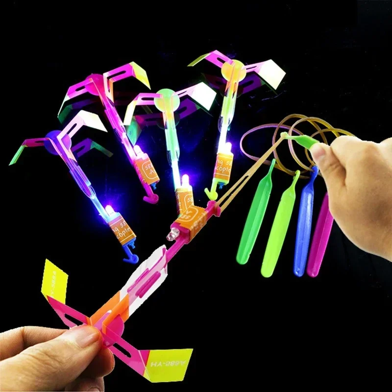 Jouets drôles de sport de plein air, lumière LED, flèche, fusée, hélicoptère, fronde, avion volant, élastique, catapulte, libellule en bambou, cadeau