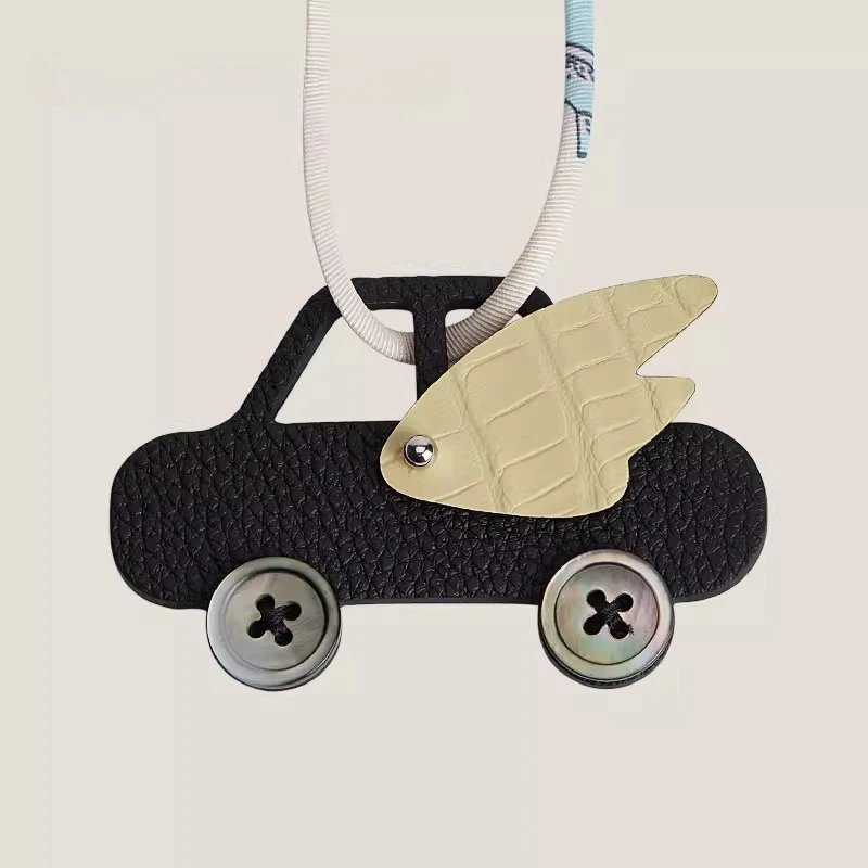 

2026 Fashion Car Bag Hanger Hand sewn Genuine Leather Crocodile Texture Wings Keychain Bag Car Pendant