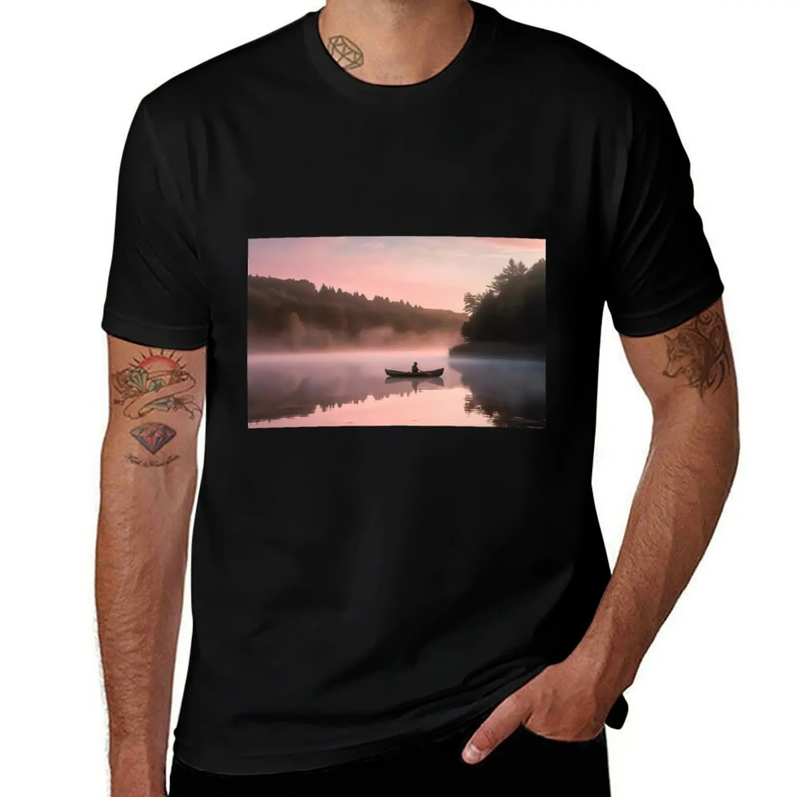

Canoe Gliding Silently Through A Mist Covered Lake At Dawn T-Shirt t shirt man cotton cotton t shirts man 100% T-Shirt