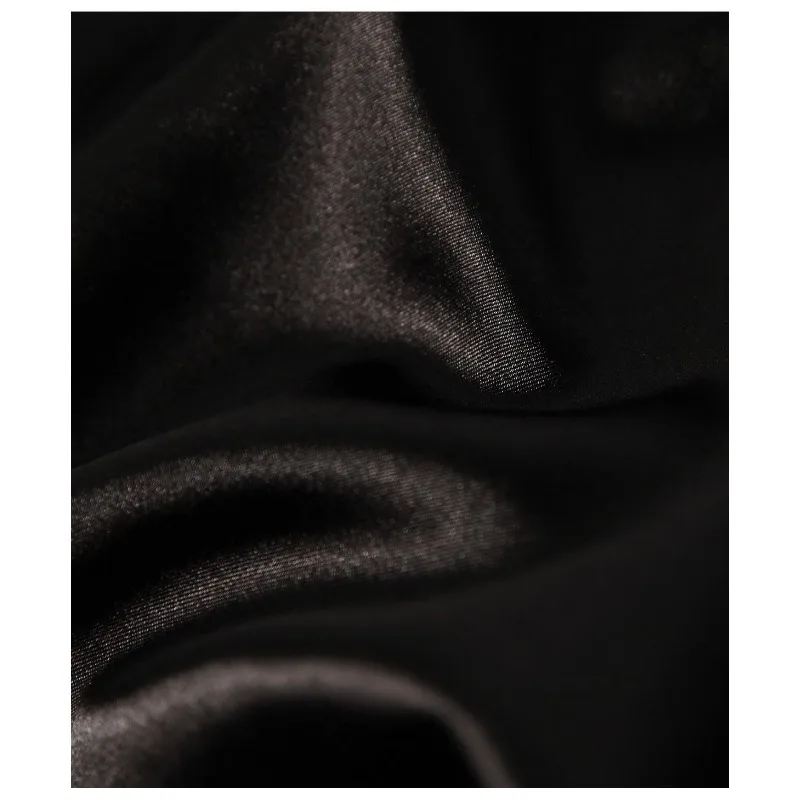 Falda acampanada adelgazante de cintura alta de otoño e invierno con purpurina fina negra abotonada de cintura alta de Color sólido