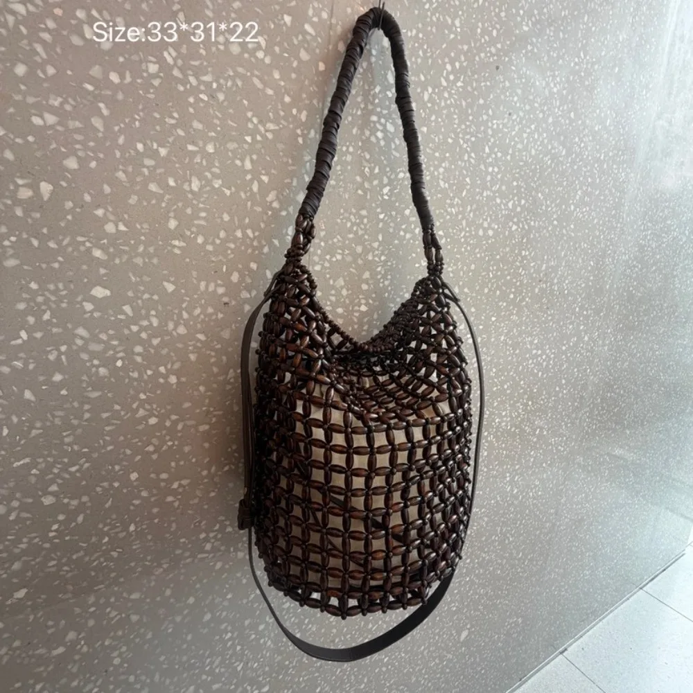 

2026 New Retro Handmade Wooden Bead Woven Hollow Bucket Bag Versatile Stylish Simple Shoulder Seaside Beach Shoulder Messenger