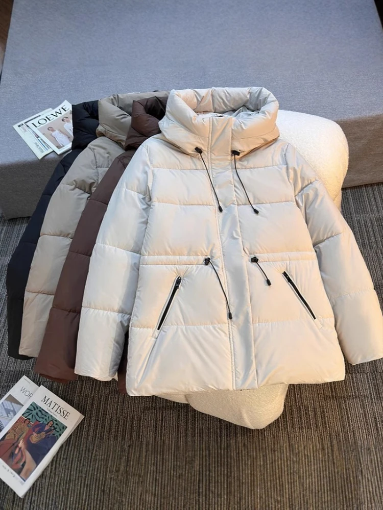 

Женские зимние куртки 2025 года, новые хлопковые куртки средней длины, стильное утолщенное теплое модное универсальное пальто с талией