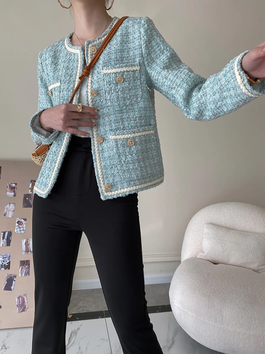 

Autumn and winter women's casual solid color round neck long sleeved pocket decorative jacket