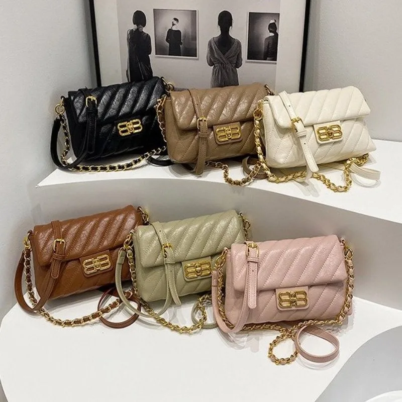 

Элегантная дизайнерская сумка для подгузников для женщин, роскошная кожаная сумка-тоут большой вместимости, стильная сумка через плечо, функциональная.