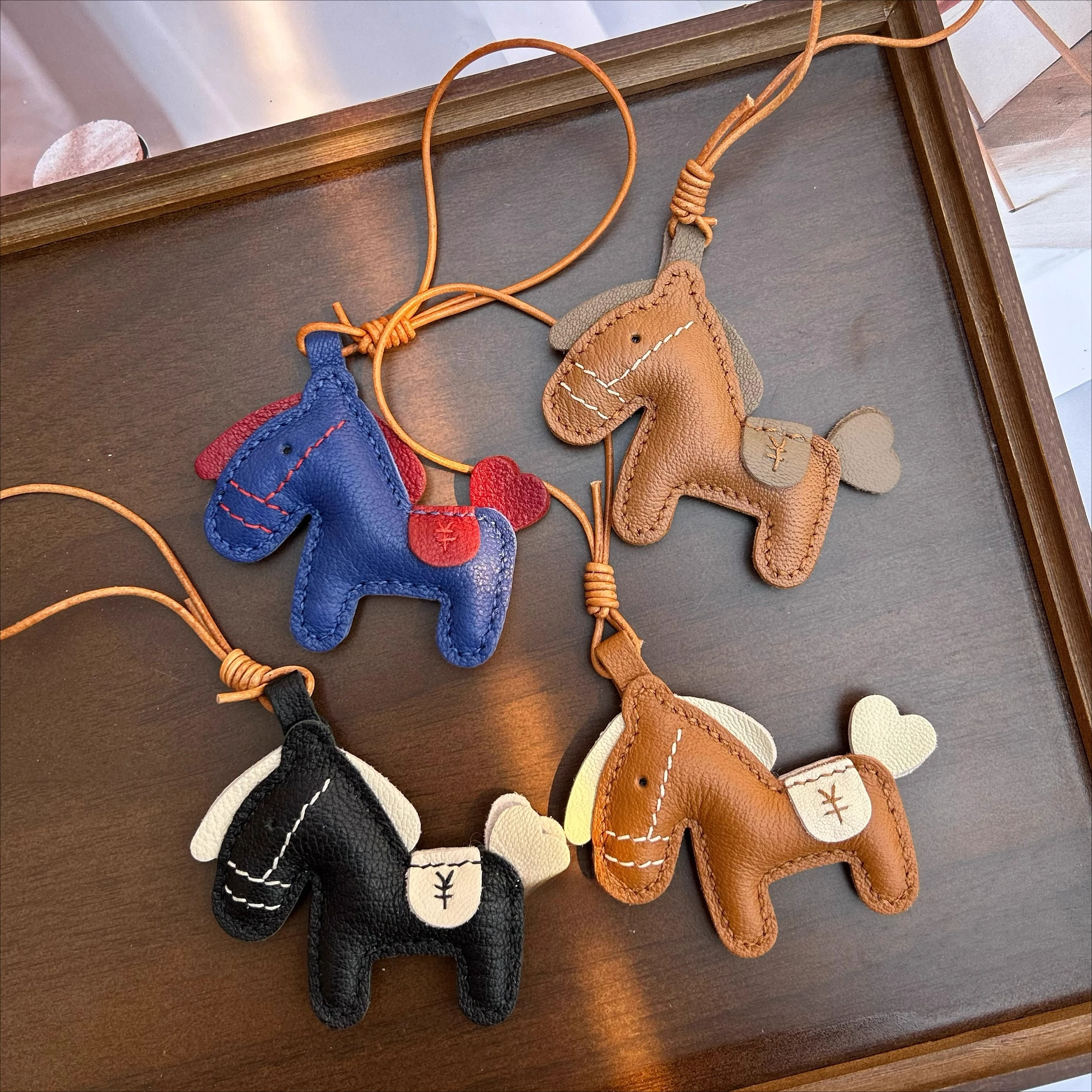 

Imported leather pony pendants, handmade accessories, pony cart keychains, finished bags, pet hangings, jewelry decorations