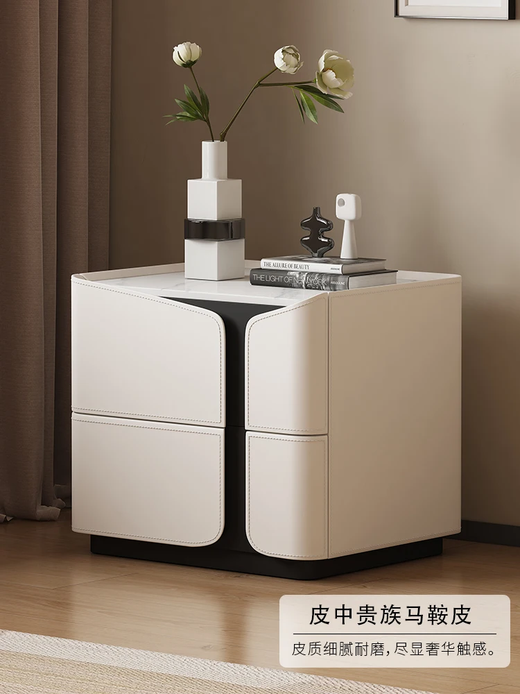 

Italian minimalist high-end designer bedside table simple modern light luxury solid wood cream style fully equipped bedroom lock