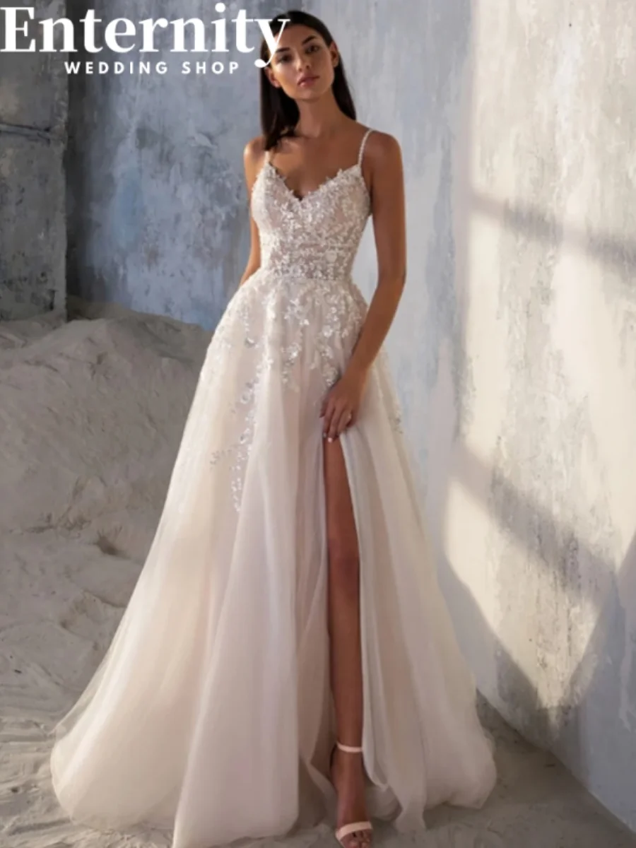 Customized Lace Appliqued Wedding A-line Dress Side Slit Backless Spaghetti Straps Sleeveless Beach Robe Customized Gowns