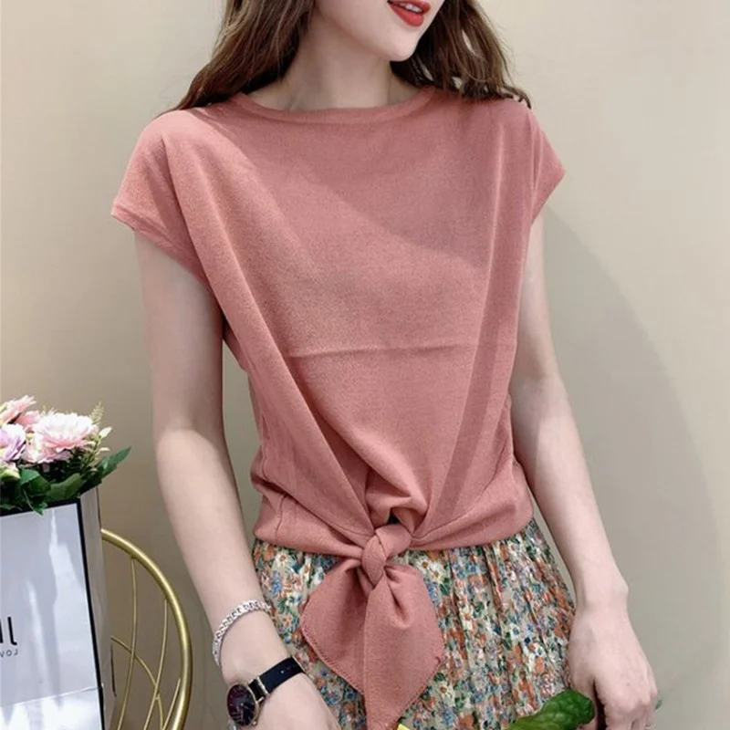 

Вязаная цветная футболка с круглым вырезом и коротким рукавом, летняя модная женская одежда для защиты от солнца, повседневная, с узлом на подоле