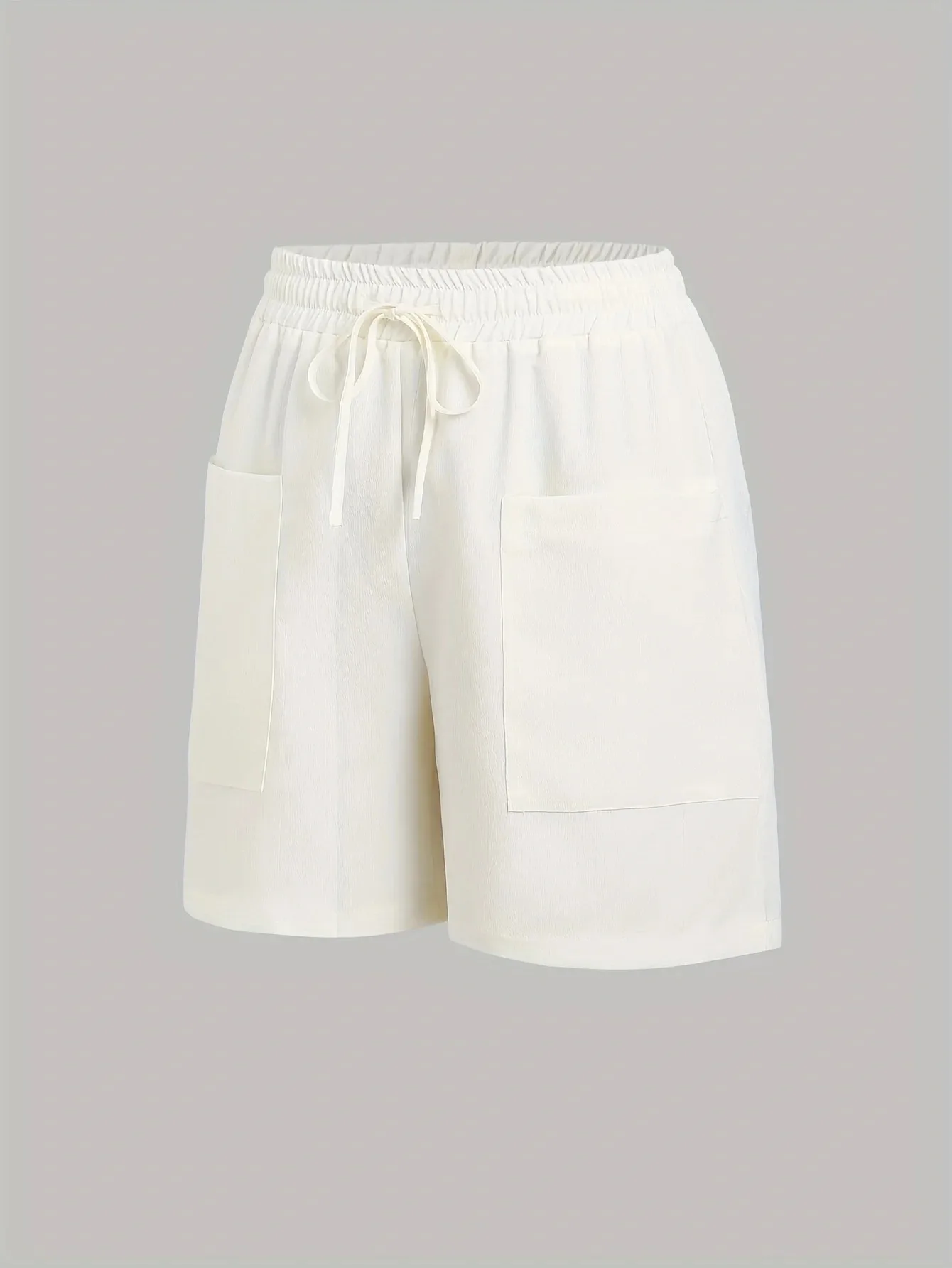 A 2-piece set of solid color casual drawstring shorts with pocket beach pants for women in 2026
