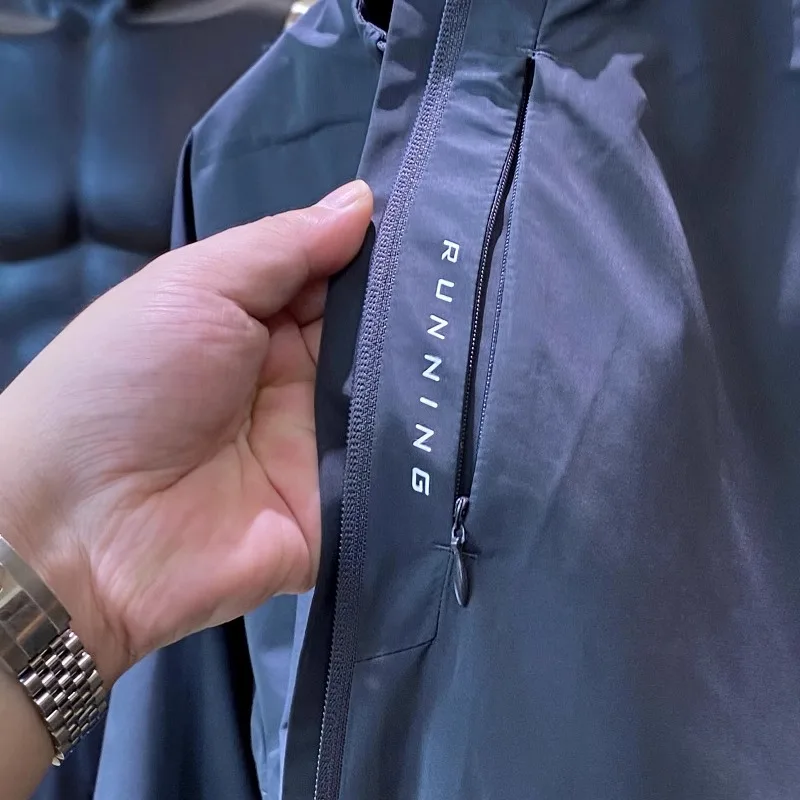 High-End Outdoor Herren Jaet Running Sport Series Herbstsaison 3D-Schneiderei Stehkragen Reißverschluss Langer Sve-Mantel