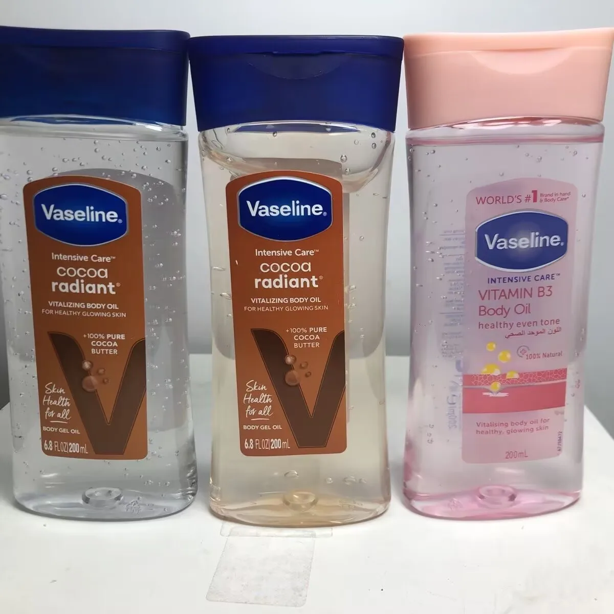 

Vaseline 200ml Cocoa Body Luminous Oil Long-lasting Moisturizing Skin Care Oil Body Brightening Anti-drying Essence Care Product
