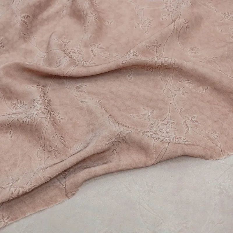 

This is a niche design fabric for clothing made of silk with the artistic style wave satin embossed crepe and dirty dyeing