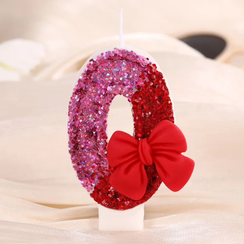 Big red bow-shaped number birthday candles, magenta candles, party gifts, birthday and anniversary candles