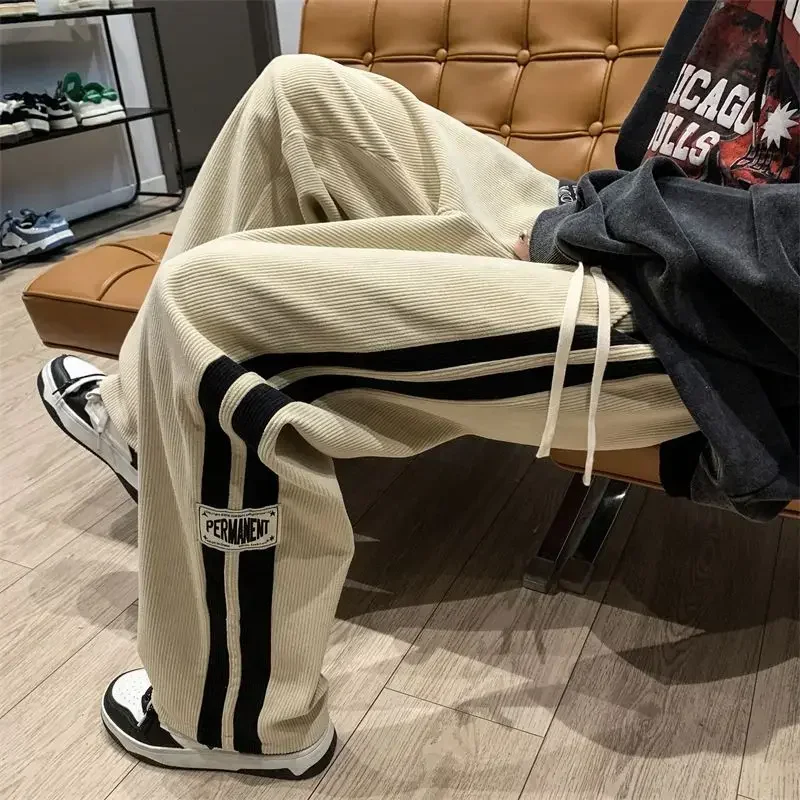 Pantaloni di velluto a coste coreano pantaloni casual all-match a gamba dritta di tendenza da uomo più pantaloni larghi a gamba larga addensati in