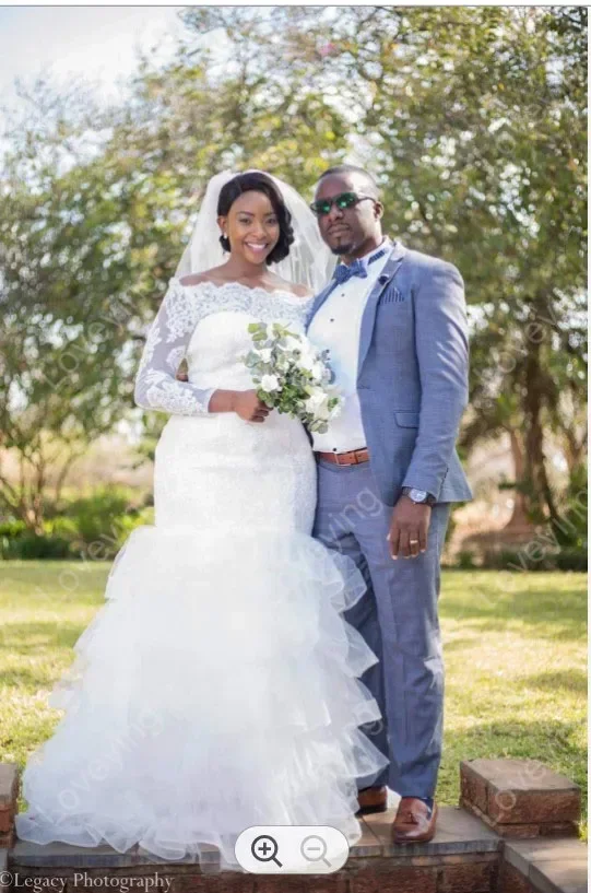 カスタマイズされた魅力的なオフショルダーアフリカ人魚長袖ウェディングドレス Vestido デ Casamento ティアードチュールブライダルドレス