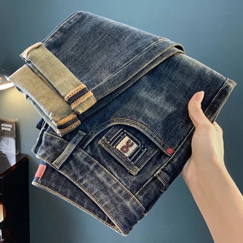 Men's jeans 2025 autumn new fashion high-end trend embroidered print loose tapered elastic pants men