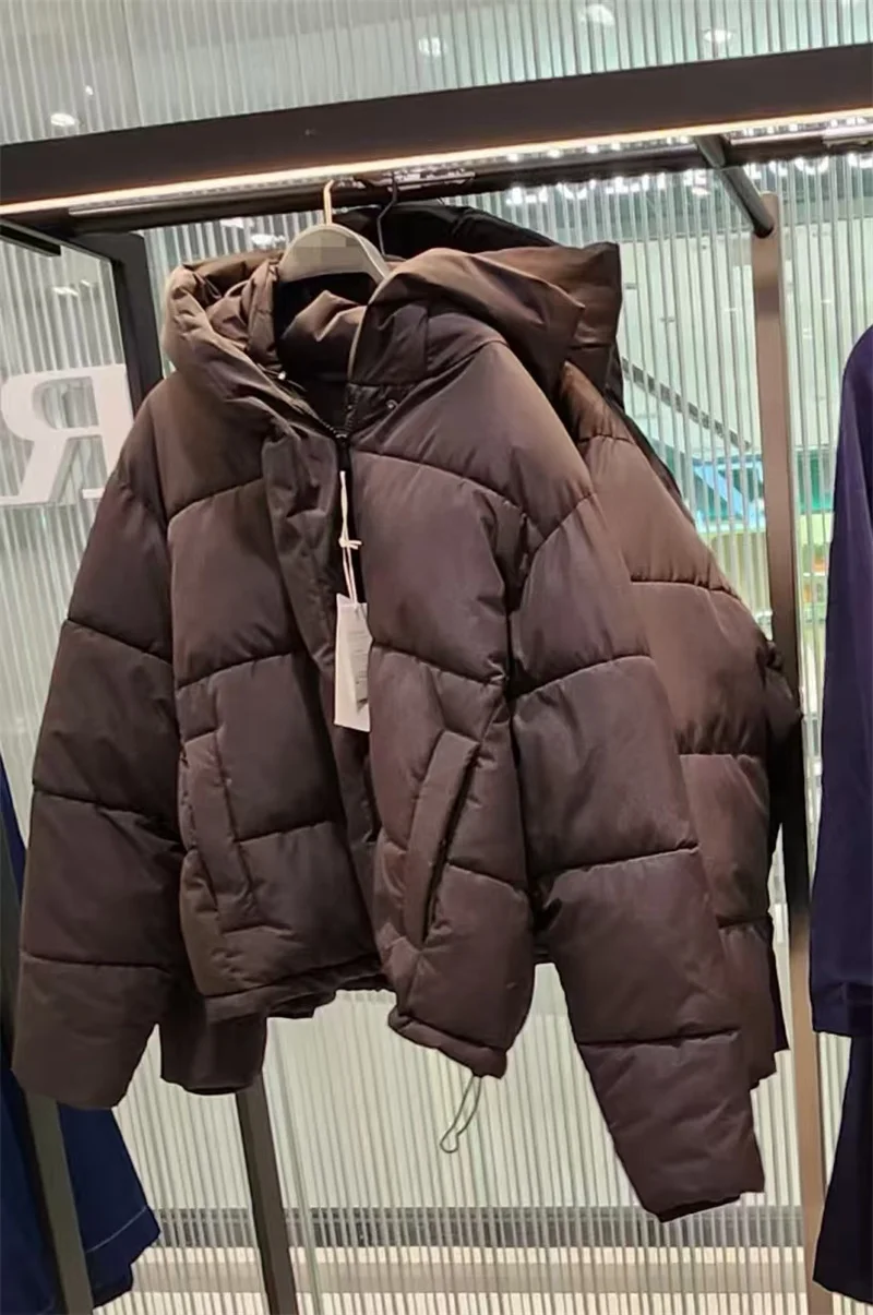 Abrigo de mujer 2025 invierno nuevo estilo Color sólido manga larga impermeable y resistente al viento chaqueta cálida con capucha elegante y elegante