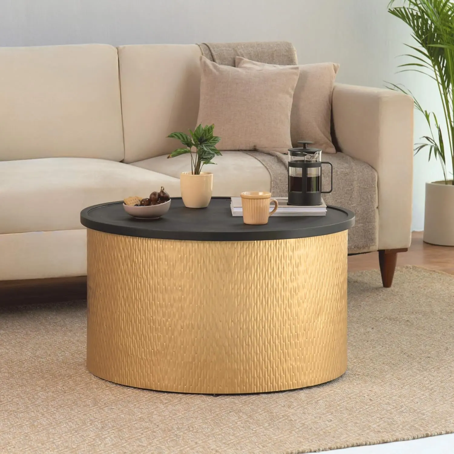 

Modern Accent Cylindrical Round Coffee Table with Black Top and Hammered Gold Metal Base, Boho Contemporary Drum Cocktail Table,
