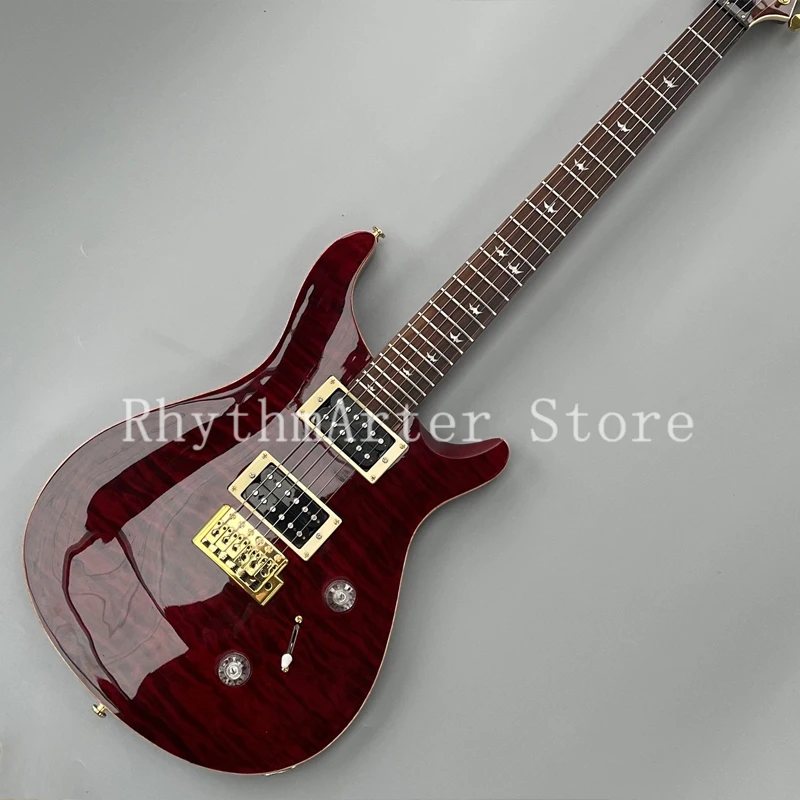 High quality electric guitar, dark red floral finish, rosewood fingerboard, gold hardware, vibrato system, 2 pickups