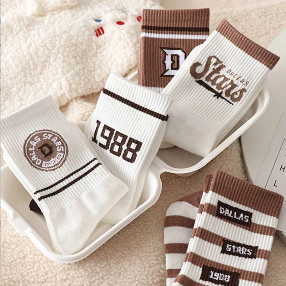 4 pairs of socks female spring and autumn students ins tide Korean version of all-in-one long tube lovers sports American suitab