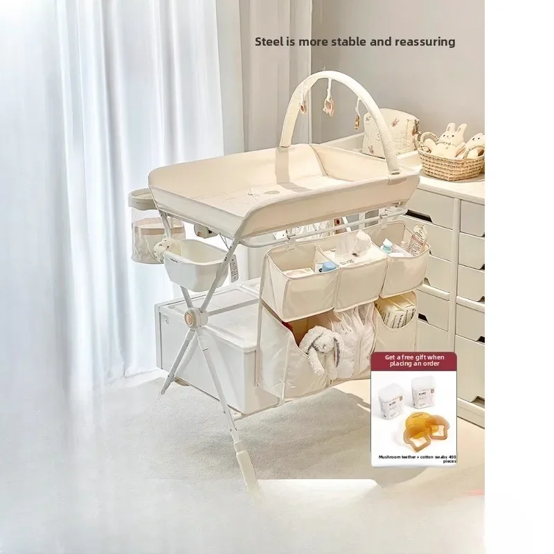 Multifunctional foldable lifting portable diaper changing bed