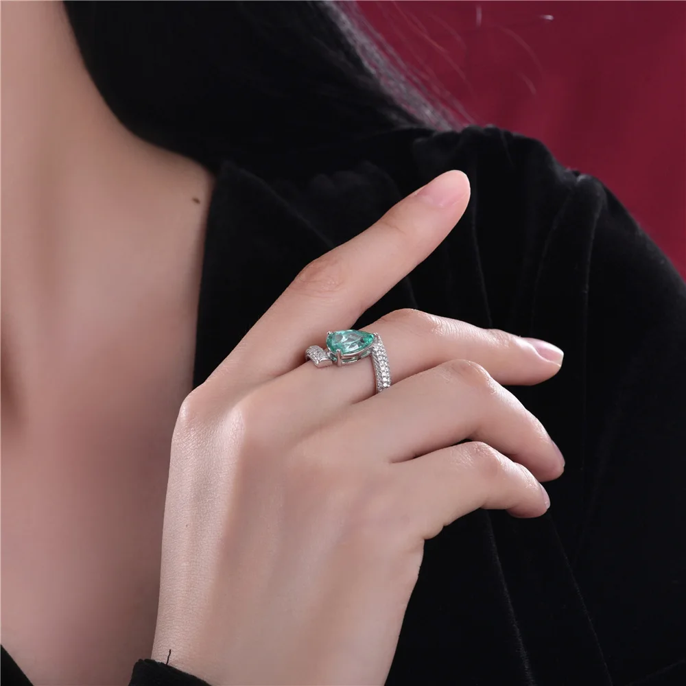 2025 قطرة الماء الجديدة Paraiba 7*11 قطع زهرة الجليد 1.5 قيراط مجموعة مطعمة الماس الأوروبية والأمريكية Ins الدائري