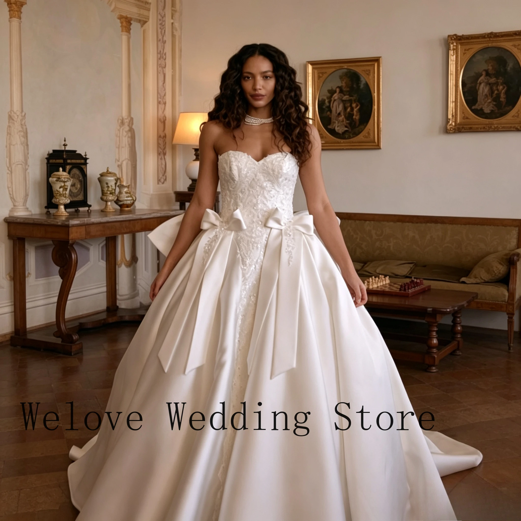 

White Bridal Gown with Sweetheart Neckline Lace Embellishments and Large Satin Bows for Weddings and Formal Events