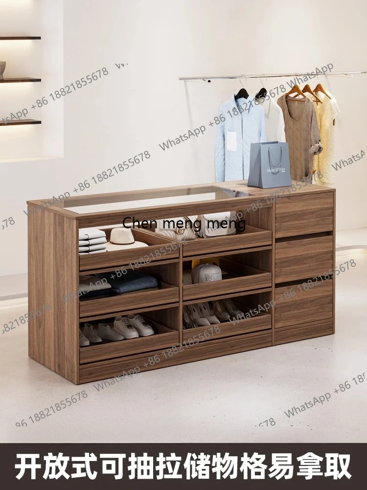 Solid wood clothing store, the flowing water platform can be pushed and pulled on both sides, and a glass jewelry display