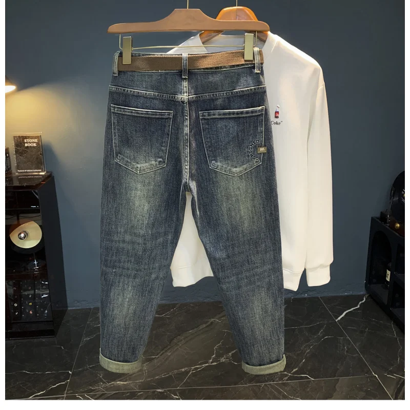 Luksusowe jeansy męskie na jesień i zimę, grube, elastyczne, w stylu retro, niebieskie, z wąską nogawką, lekko rozszerzane męskie spodnie.