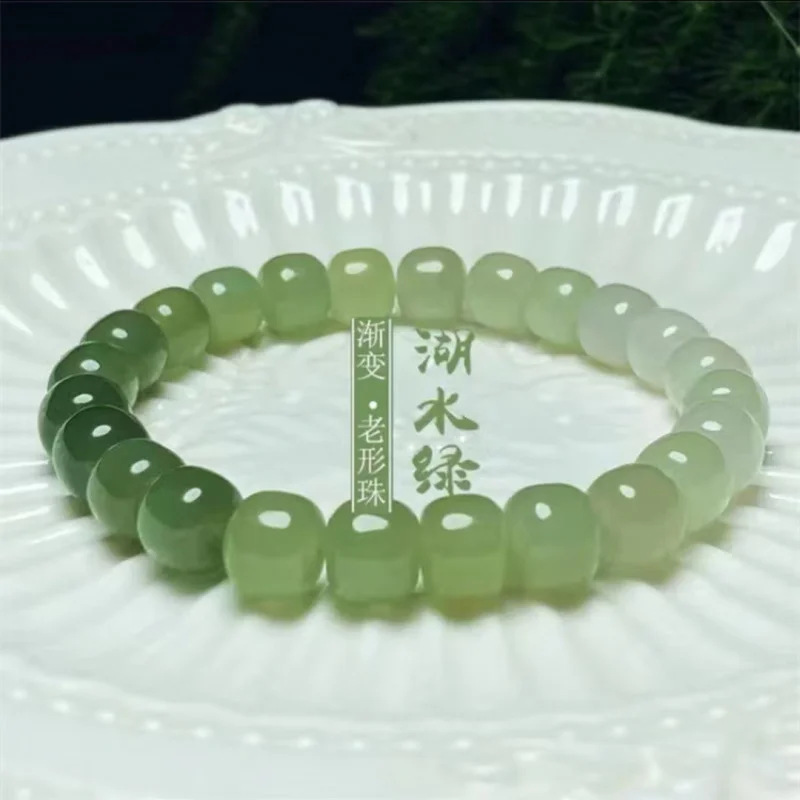 

Hetian Jade Gradient Color Old-Style Handmade Round Bead Carving Bracelet