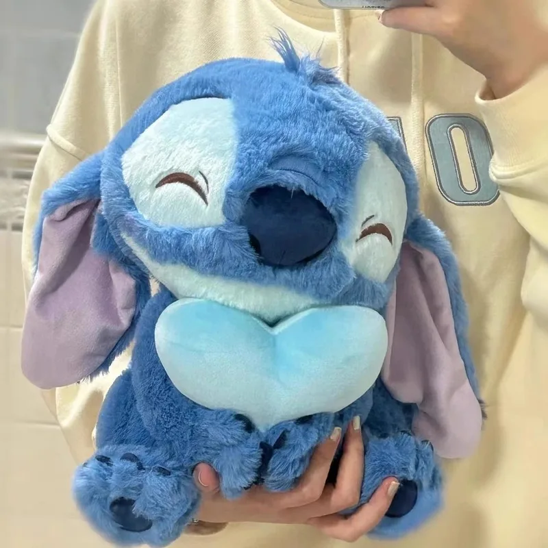 Muñeco de peluche de Stitch de Disney, colección de Anime de punto de corazón de amor, recuerdo, regalo de cumpleaños para niños, juguete y regalos del Día de San Valentín, recuerdo de fiesta