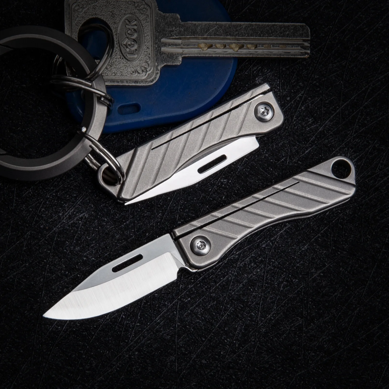 

New Titanium Alloy Mini Portable Folding EDC Keychain Knife