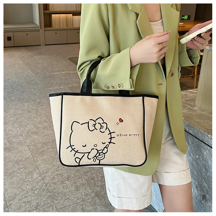 

Sanrio Hello Kitty Women's Shoulder Bag Cartoon Cosmetic Bag Fashion Print KT Tote Bag Girls Large Capacity Commuter Bag Gift