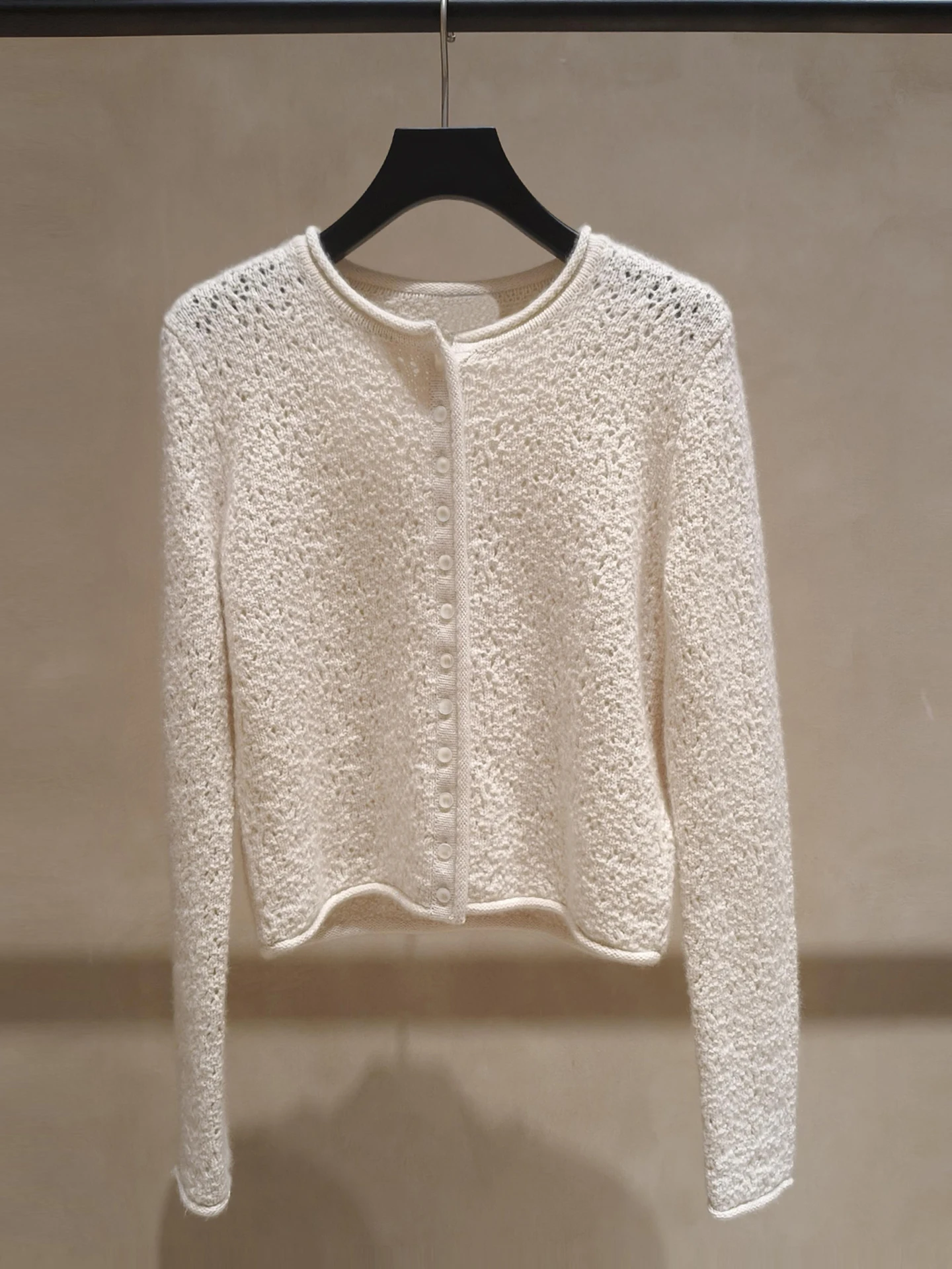 

High-End Women's Knitted Hollow out White Cardigan Spring 2026 Commute Style Regular Fit Soft Medium Length Long Sleeve