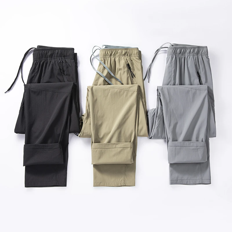 قسط عارضة الأزياء في الهواء الطلق للماء الرباط جيوب كثيرة مستقيم الرجال تنفس الرياضة السراويل الطويلة تخفيف السراويل