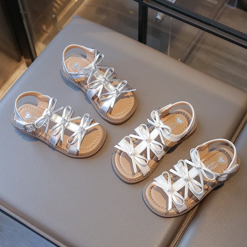 

Children's Sandals Girl Sweet Bowknot Versatile Kids Fashion Summer Flat Sandals Hollow-out Causal Princess Wedding Party Shoes