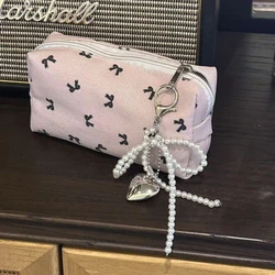 Bow pencil case Student stationery storage bag Girl's heart simple wind large capacity Pencil case Cosmetic bag Girl gift