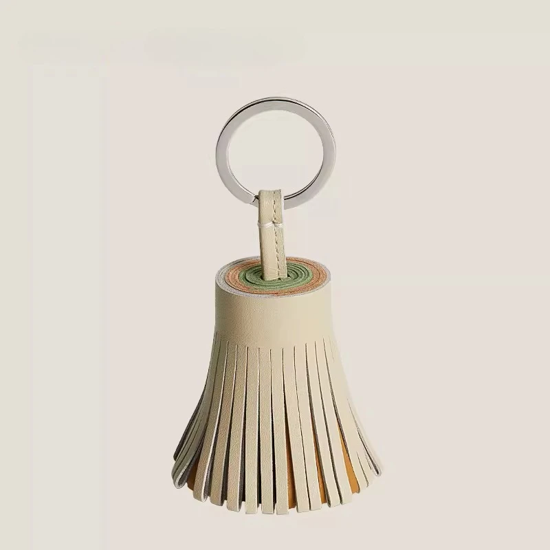 

2026 vintage leather tassel flower ball keychain hand sewn light luxury color blocked bag hanging women's bag pendant