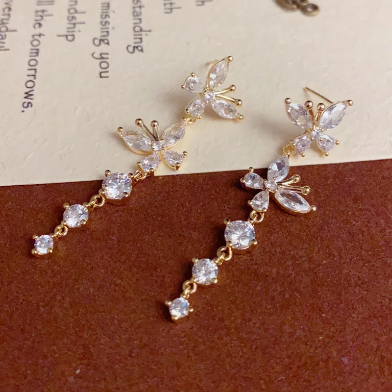 Fashion versatile butterfly fringed earrings with diamonds, temperament light luxury personality super flash ear jewelry