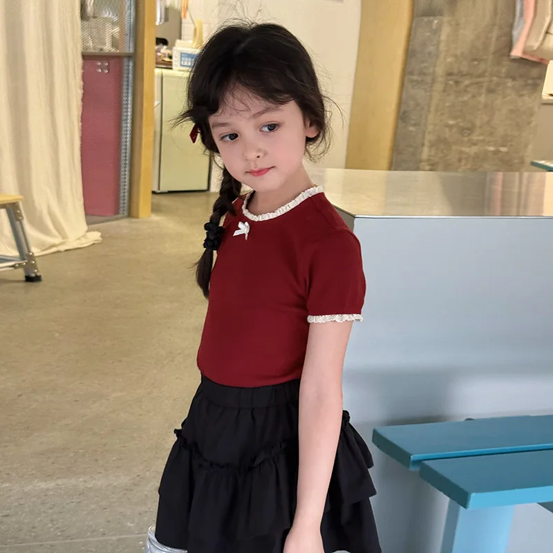 

Детская одежда Детские футболки Корейский стиль Милая и стильная футболка с бантом и кружевной отделкой Летняя футболка для девочек с короткими рукавами