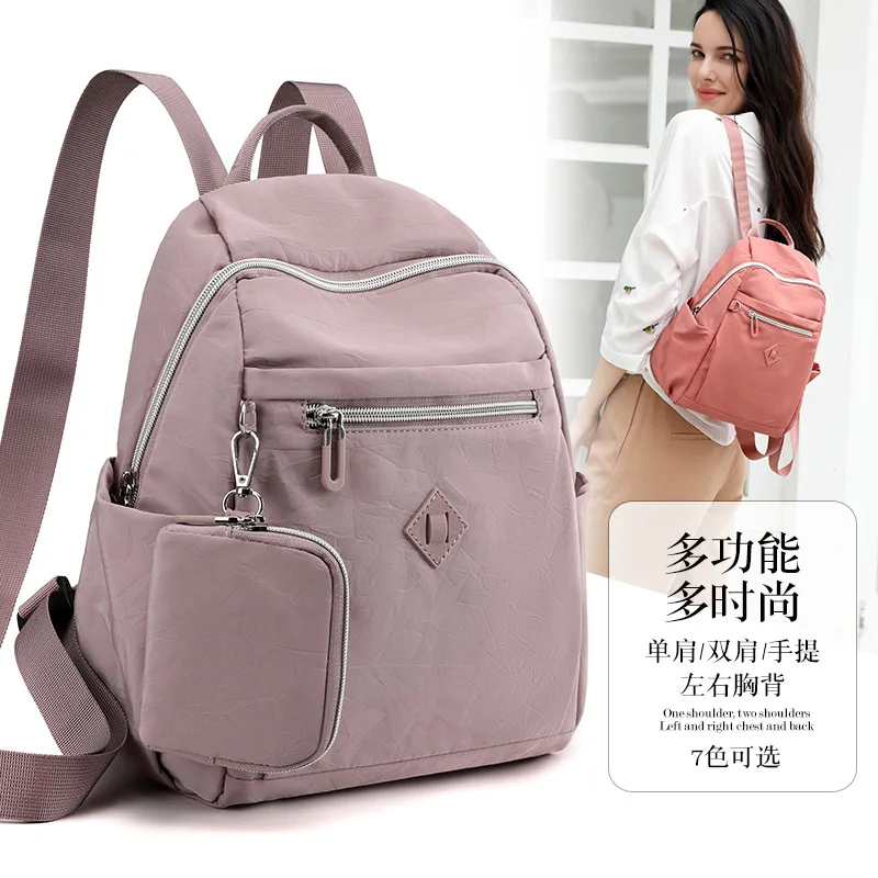 Large-capacity backpack for women, light and thin multi-pocket water-resistant travel bag, letter coin purse, schoolbag