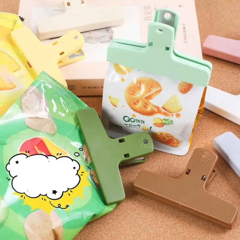 pack-of-9-binders-clips-for-office-school-and-home-use-with-strong-plastic-construction-and-colorful-design-h8wd