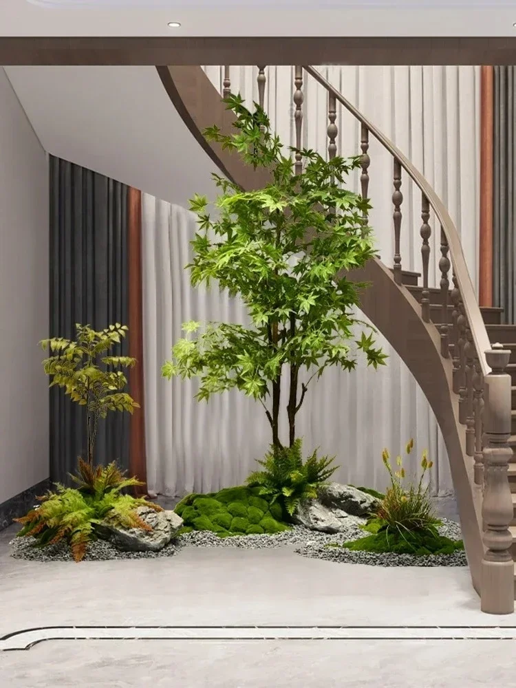 Simulation green plant maple rockery stone landscaping under the rotating staircase green plant stone landscape decoration