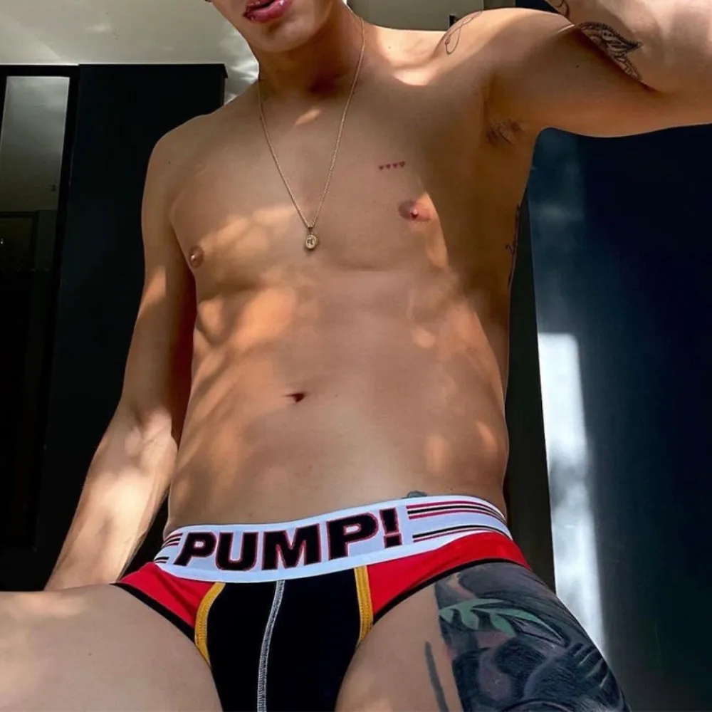 Calzoncillos cómodos deportivos para hombre, ropa interior de algodón, calzoncillos triangulares para hombre, bragas sexis con aumento de cadera, lencería de moda para hombre Gay