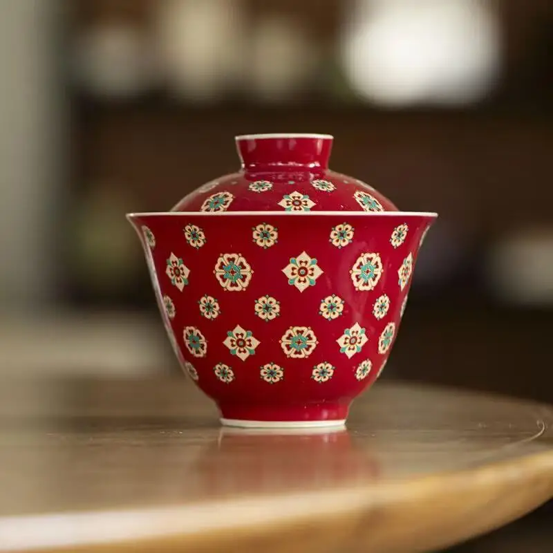 

Red Longquan celadon ceramic teacup set with pipa pattern, suitable for home use, featuring festive red color and traditional Ch