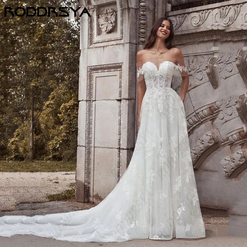 RODDRSYA Off Shoulder Wedding Dresses Boho Illusion Tulle Backless Sleeveless Bride Party Elegant Boat Neck Lace Svatební šaty