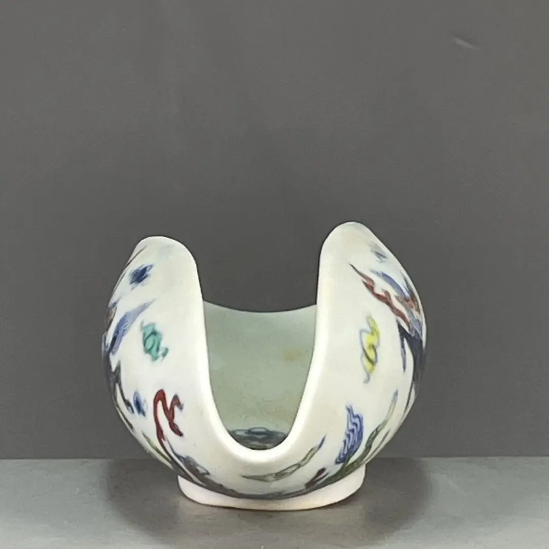 A replica of tea spatula and tea set with doucai qilin patterns made during the Chenghua period of the Ming Dynasty in China