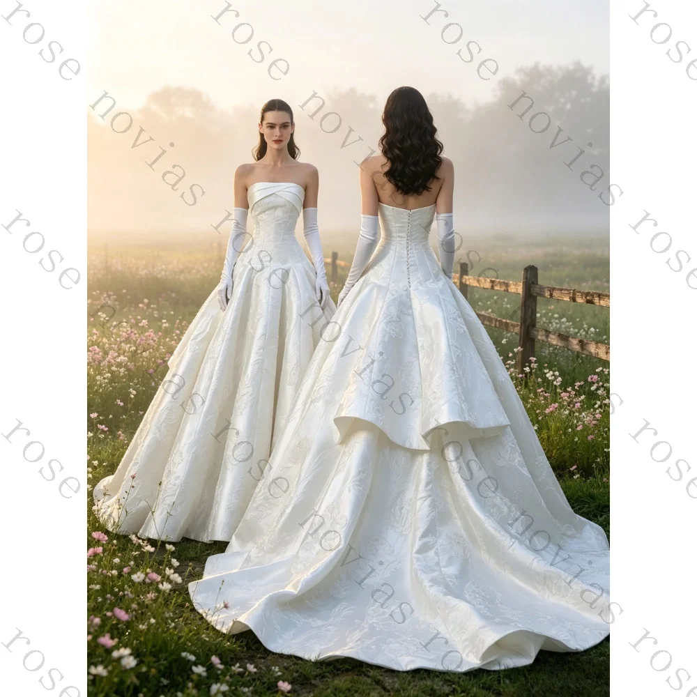 Customized elegant strapless applique wedding dress 2026 simple waist cinching princess fluffy bridal gown suitable for parties